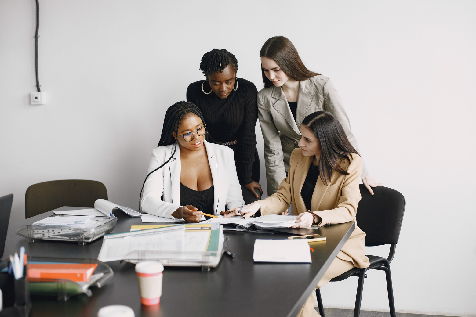 Female Employees Having a Meeting